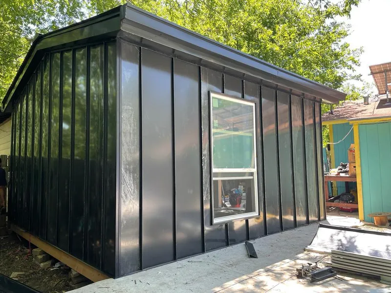 Black standing seam metal wall panels for Metal Roof Installation in Moline